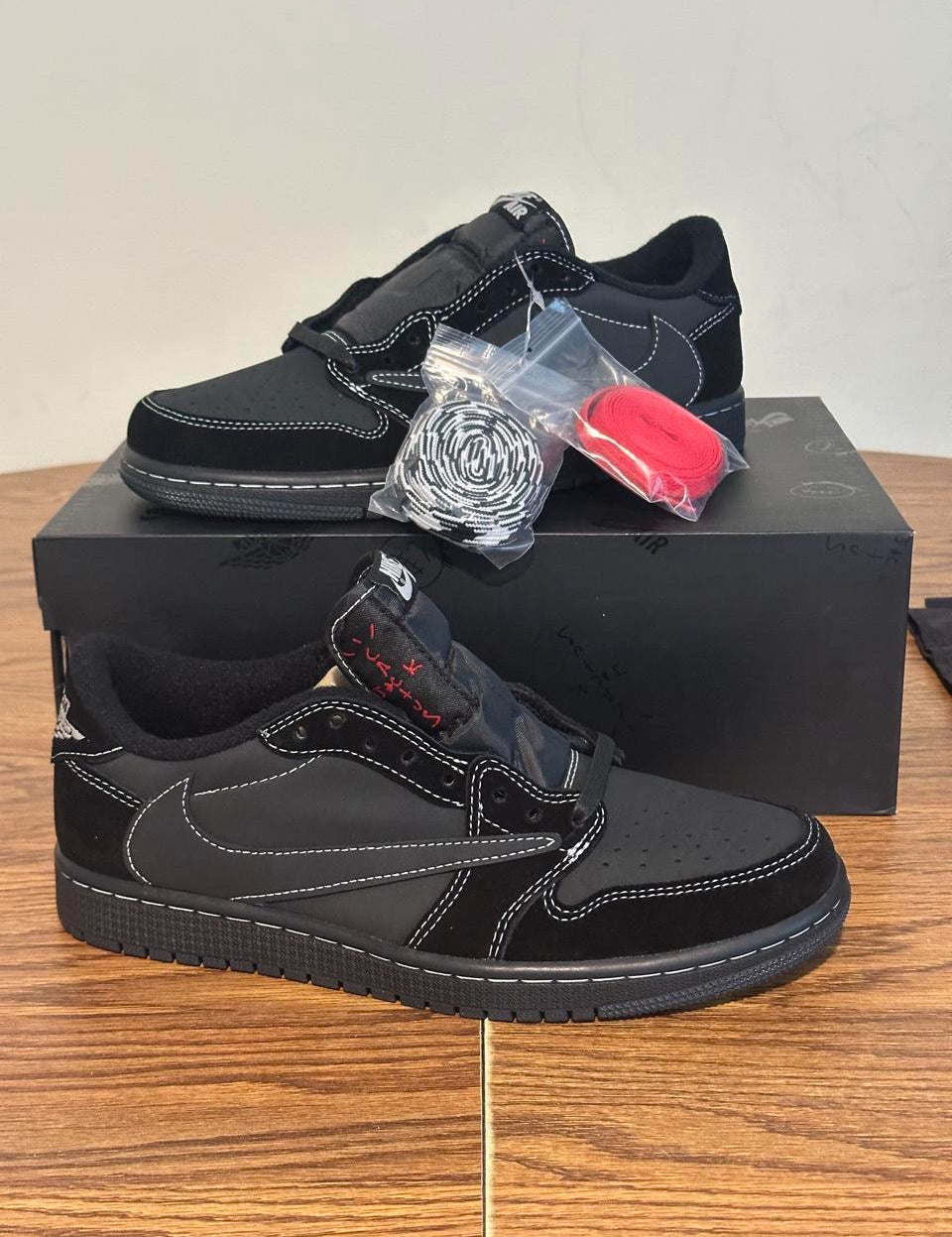 Black Jordan 1s Low Travis Scott’s